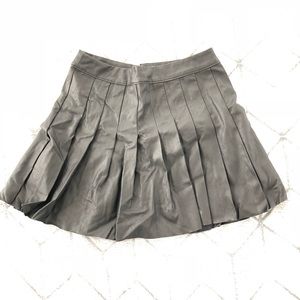 Pleated leather mini skirt